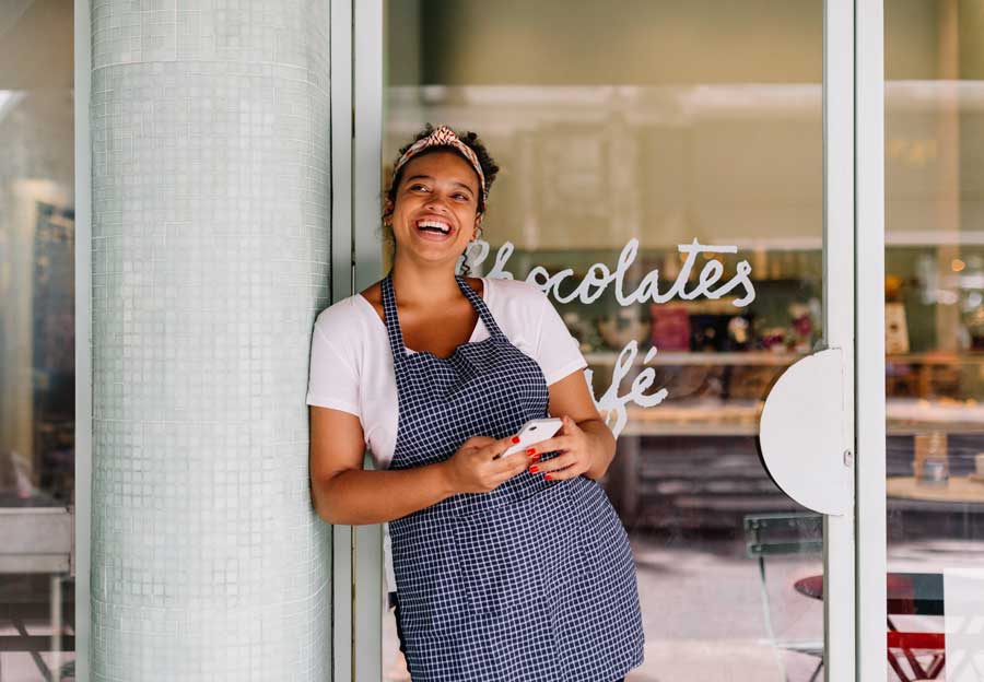 Woman standing in front-of business